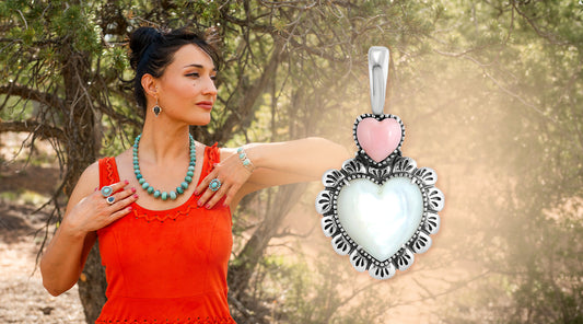 Woman wearing American West Jewelry turquoise necklace, bracelet, and rings, featured with a sterling silver pink opal and mother of pearl heart pendant — perfect jewelry gifts for Mom.