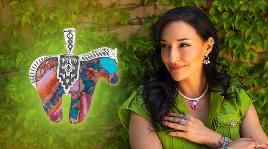 American West Jewelry sterling silver Painted Desert Fusion Spirit Horse pendant enhancer alongside a woman wearing the pendant with layered necklace, heart earrings, and gemstone rings, following the path of her spirit stone