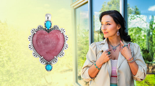 American West Jewelry sterling silver rhodonite and Sleeping Beauty turquoise heart pendant enhancer worn by a woman styled in colorful gemstone necklace, earrings, rings, and bracelets celebrating Western fashion
